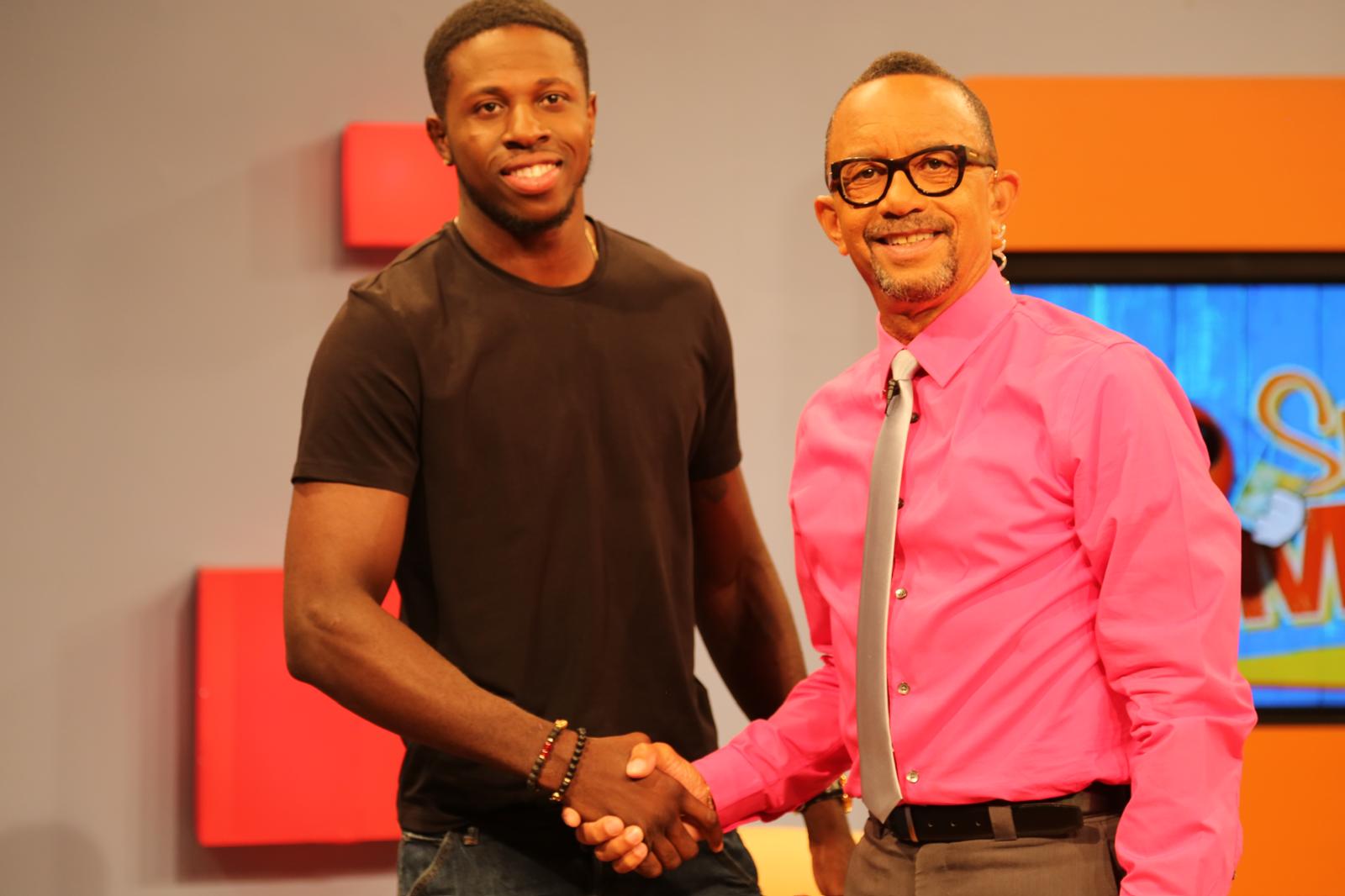 Randy Brown shaking hands